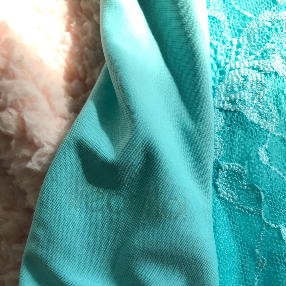 Wear Moi light blue leotard
